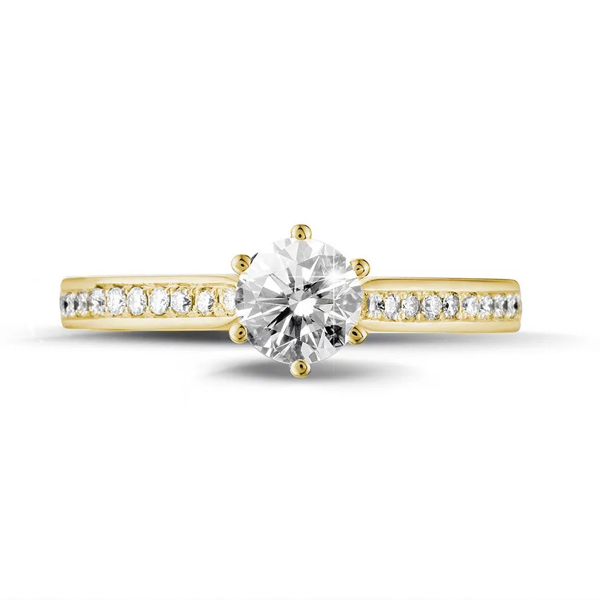 0.50 quilates anillo de oro amarillo de diamantes con diamantes en los lados 