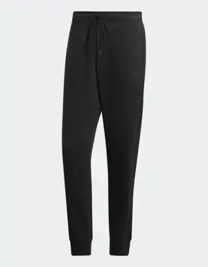 Adidas Pantalón Essentials Tapered Cuffed 3 bandas