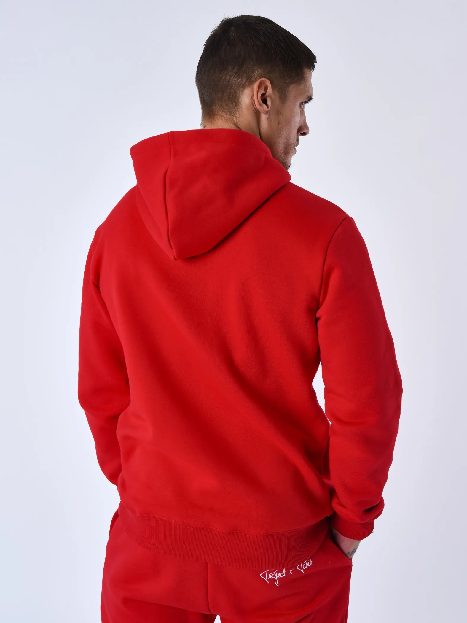 Chaqueta con capucha e inserción bimaterial
