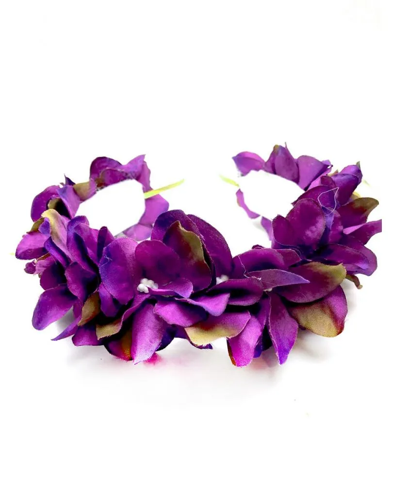 DIADEMAS MORADAS DE FLORES PARA LLEVAR CON TU TRAJE EN BODAS