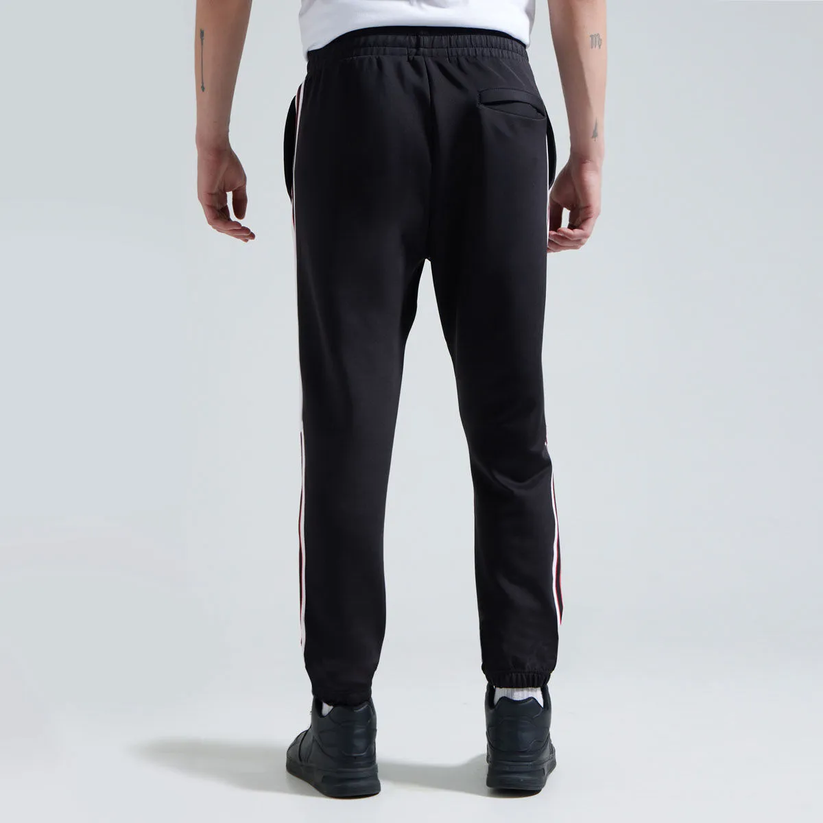 Jogger Con Franjas En Los Costados