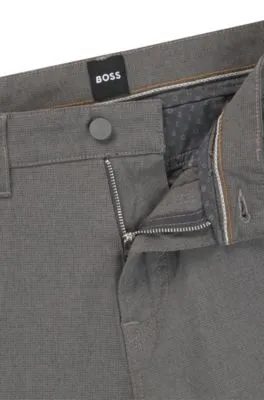 Pantalones regular fit de tiro medio en dobby elástico