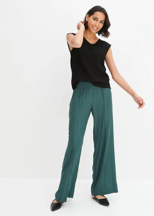 Pantalón ancho de viscosa con cintura alta de nido de abeja y tejido de crepé verde mate