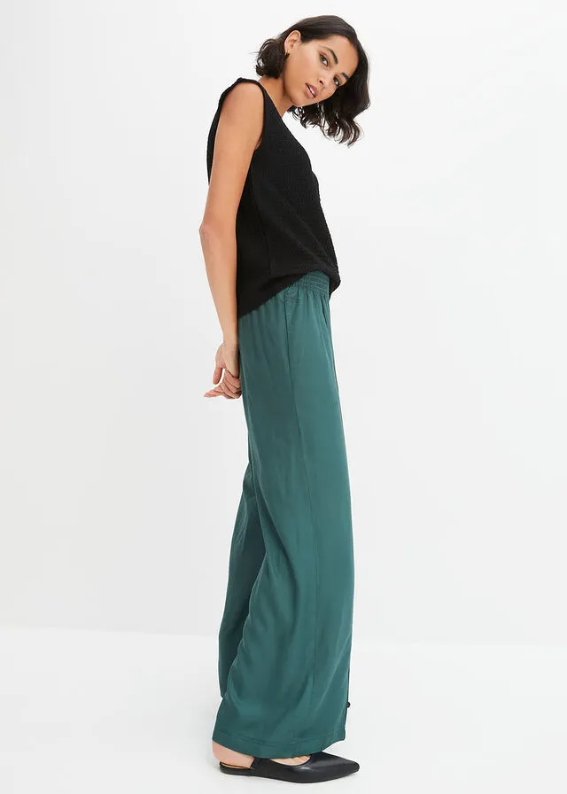 Pantalón ancho de viscosa con cintura alta de nido de abeja y tejido de crepé verde mate