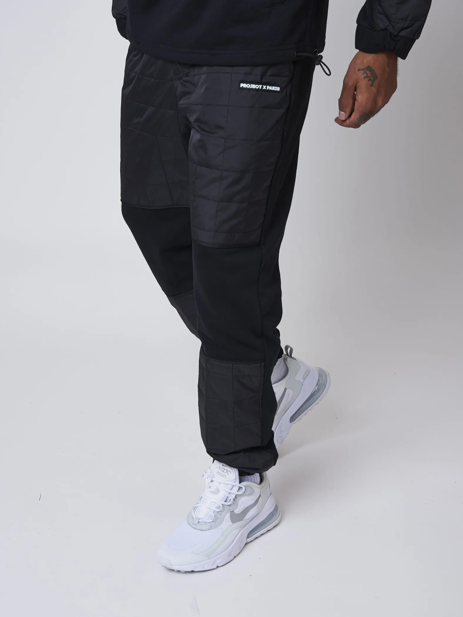 Pantalón de chándal con inserción cuadrada de nailon acolchado