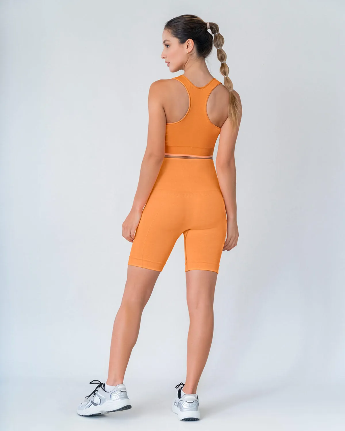 Top sin costuras doble faz con soporte medio de busto